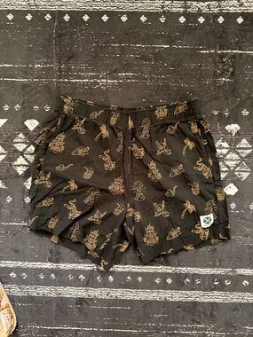 Black Shorts with Gold Tropical Print